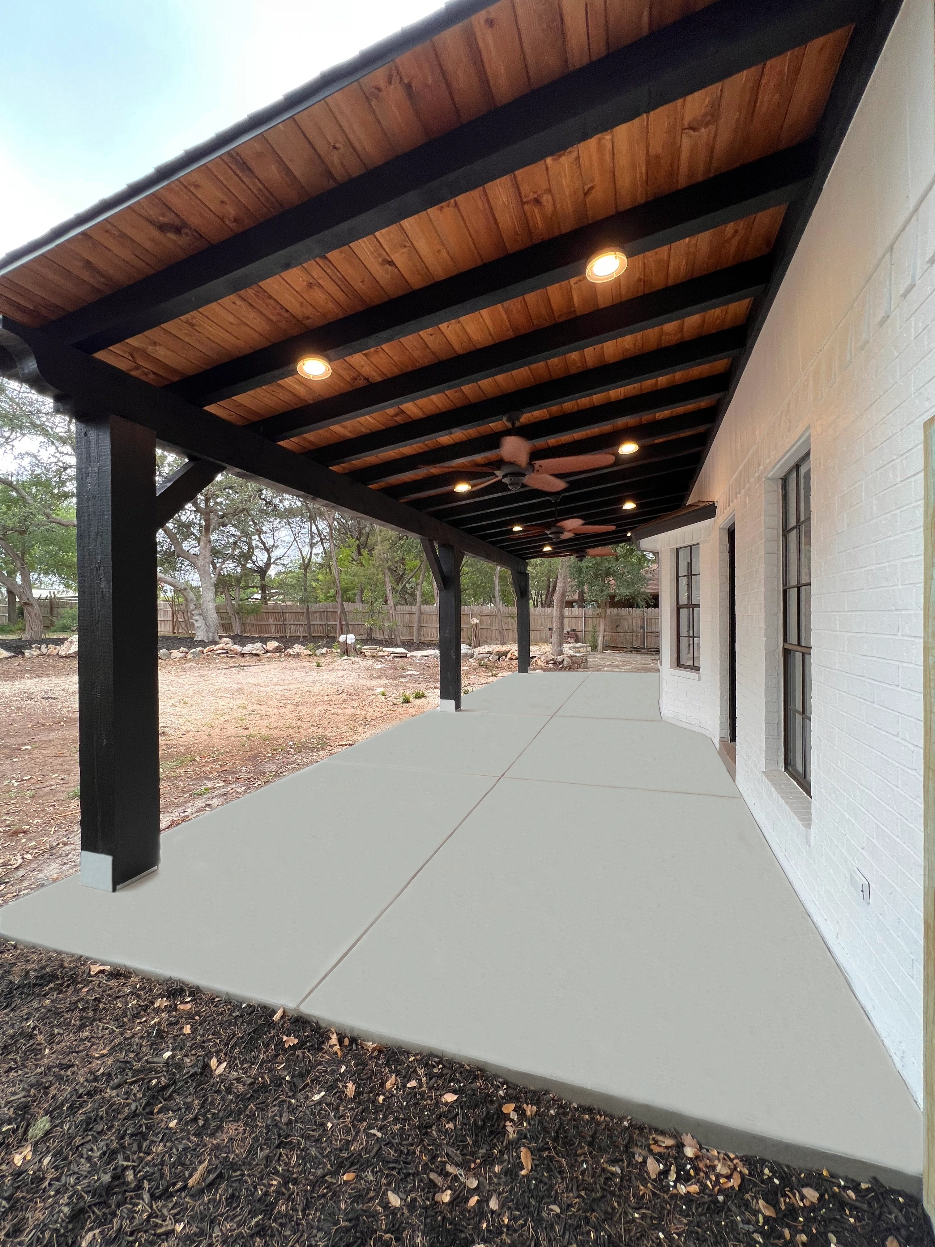 Home remodel in New Braunfels with kitchen remodel and bathroom remodel including custom outdoor living space completed by Kirk Homes Services.