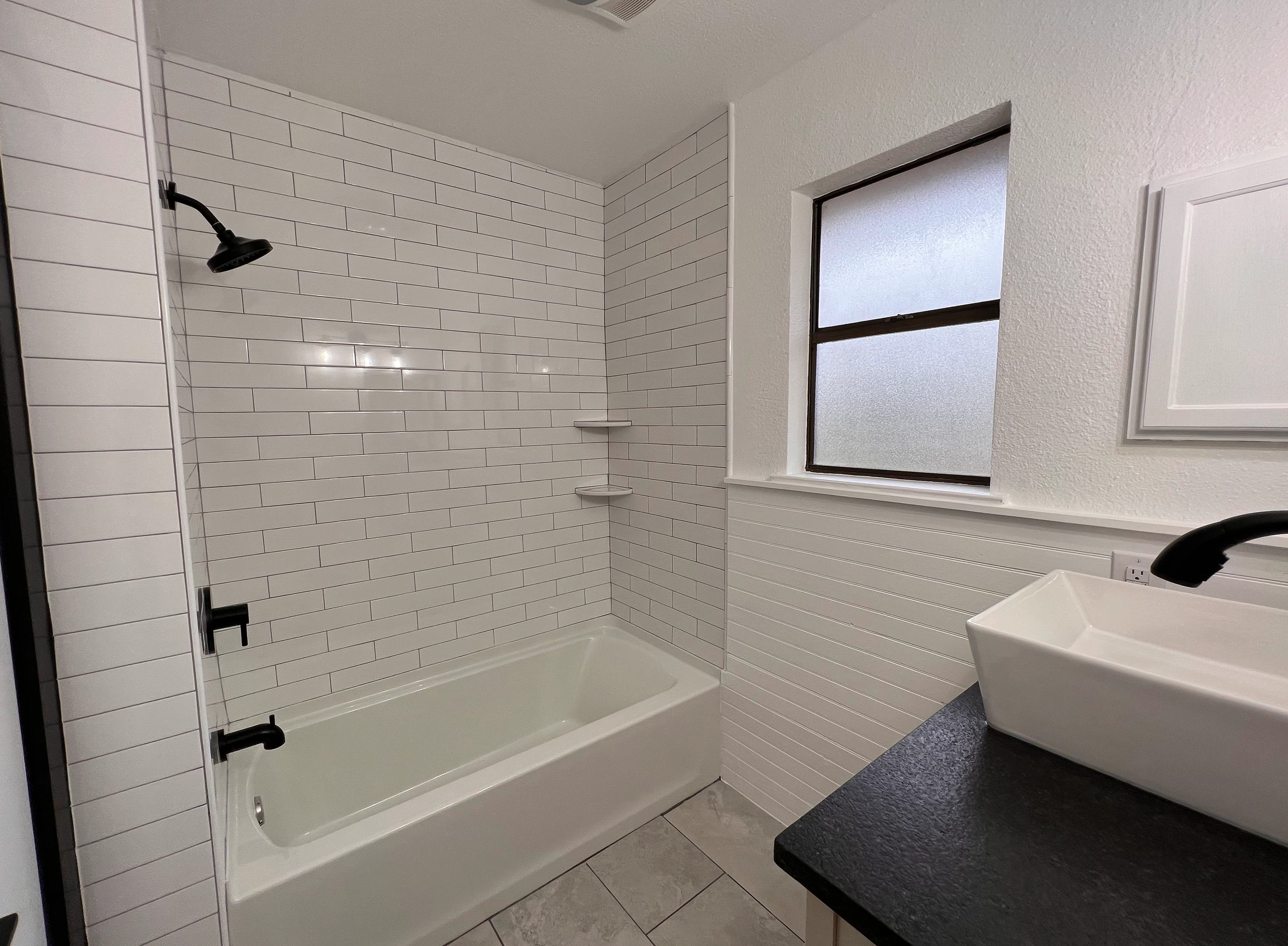 Home remodel in New Braunfels with kitchen remodel and bathroom remodel including custom tile work  completed by Kirk Homes Services.