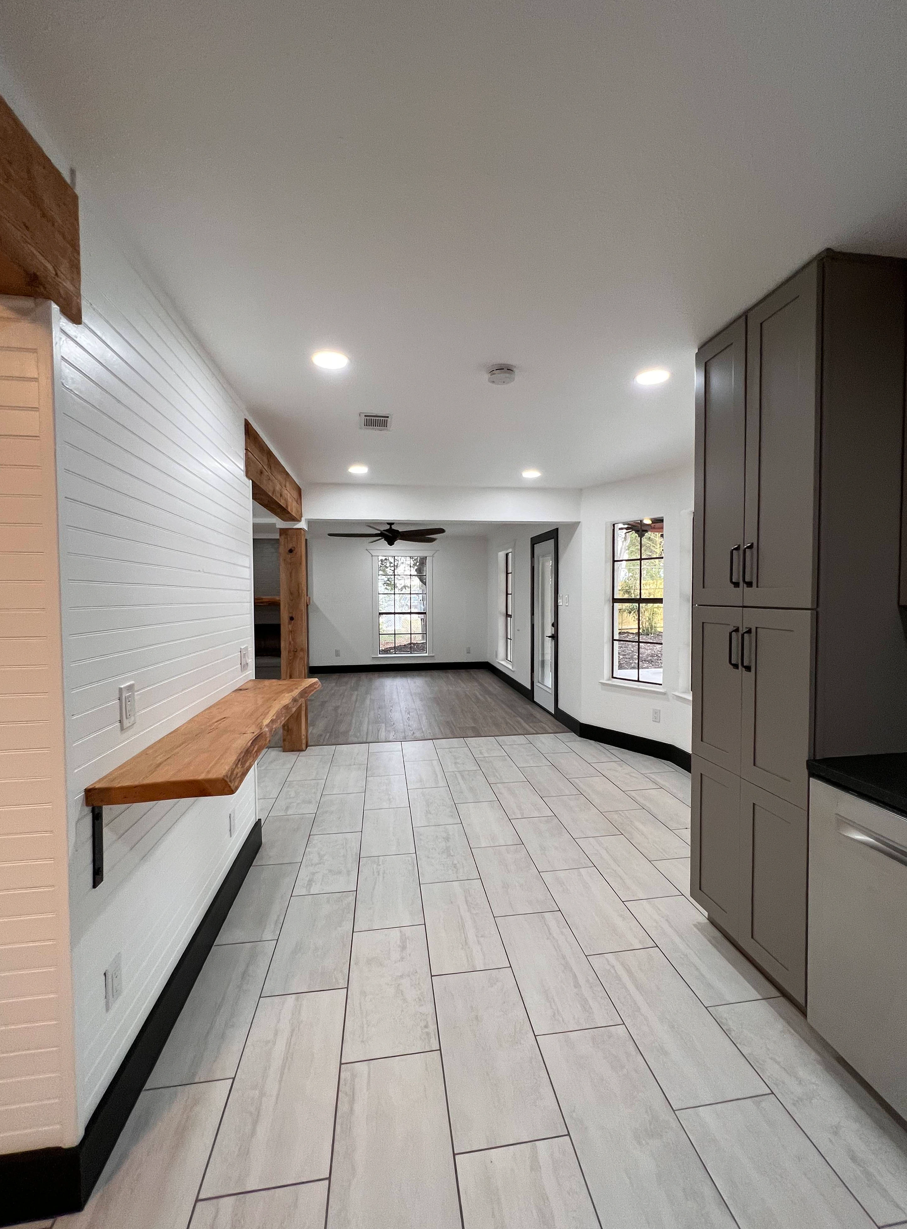 Home remodel in New Braunfels with New Flooring and New Cabinets completed by Kirk Homes Services.