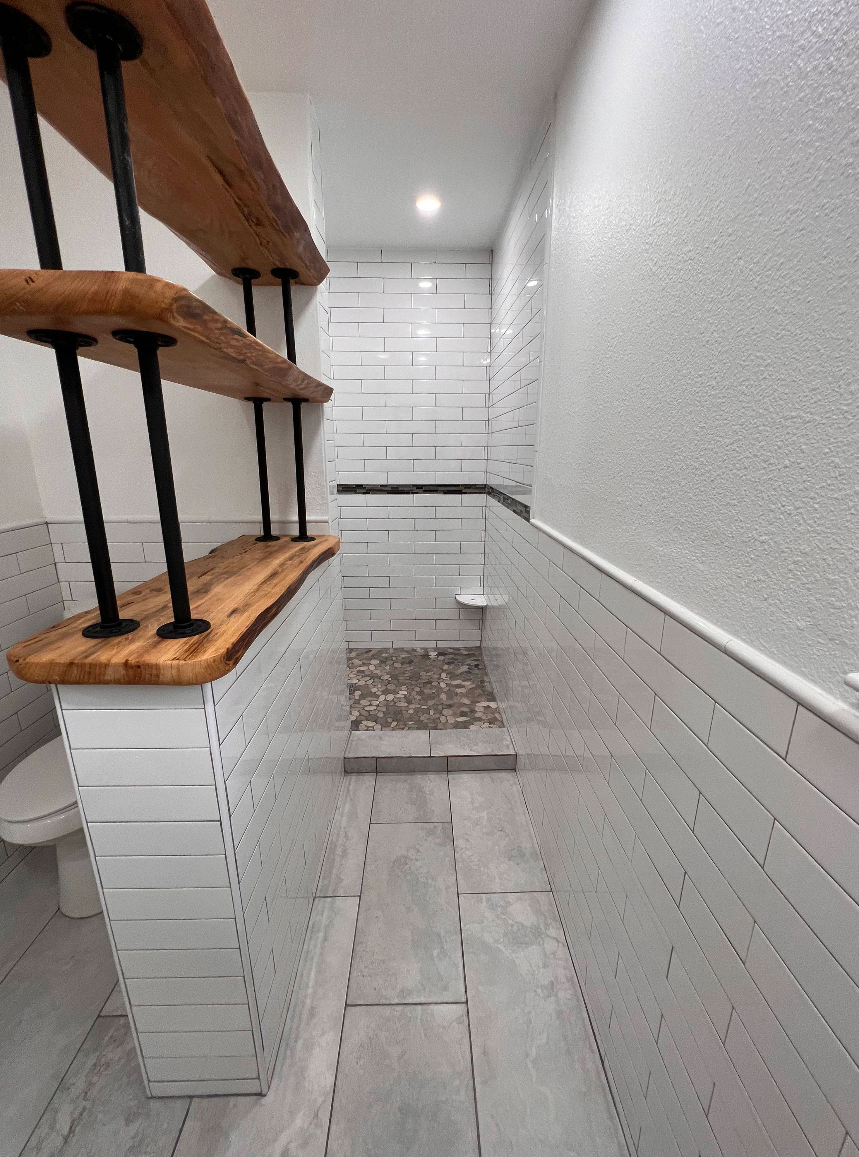 Home remodel in New Braunfels with kitchen remodel and bathroom remodel including custom tile work  completed by Kirk Homes Services.